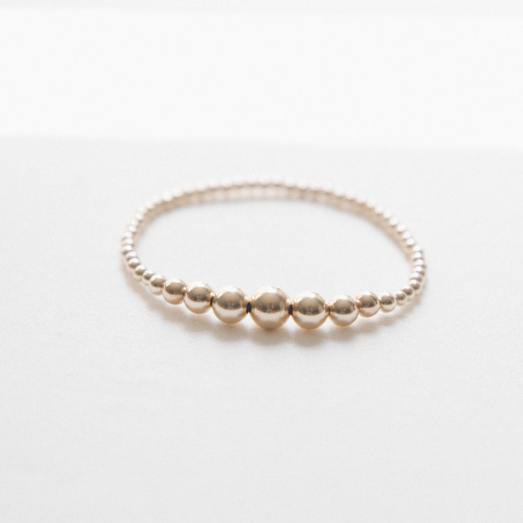 Plain Gold Bracelets with Graduated Beads